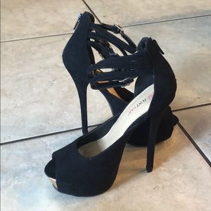 Black and gold heels